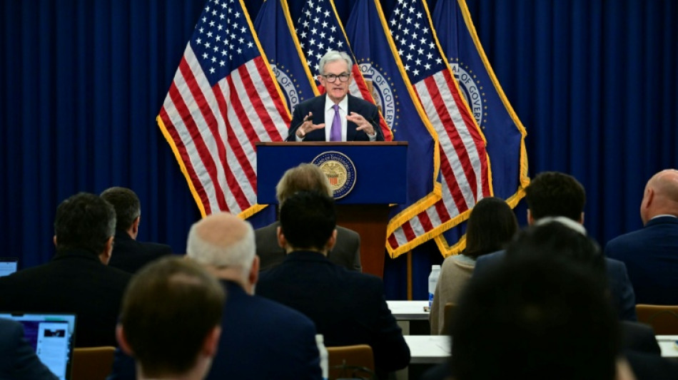 Divided US Fed makes third straight rate cut, signals higher bar ahead