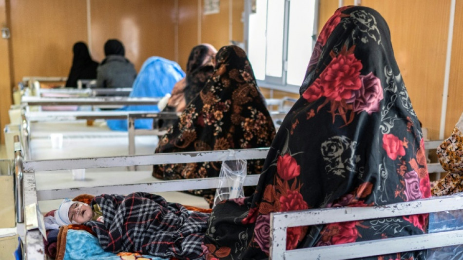 Afghan mothers seek hospital help for malnourished children