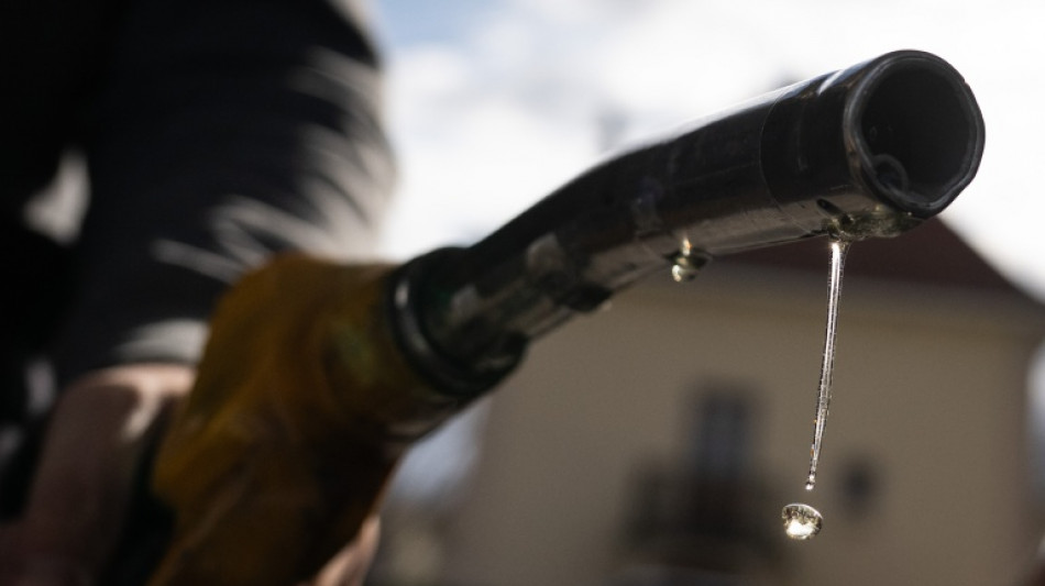 Oil hits $116 with stocks mixed on earnings, AI