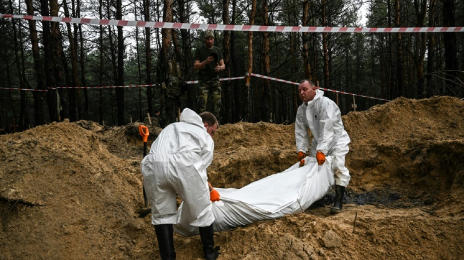 Pr&egrave;s d'Izioum, les morts de la guerre enterr&eacute;s dans une for&ecirc;t