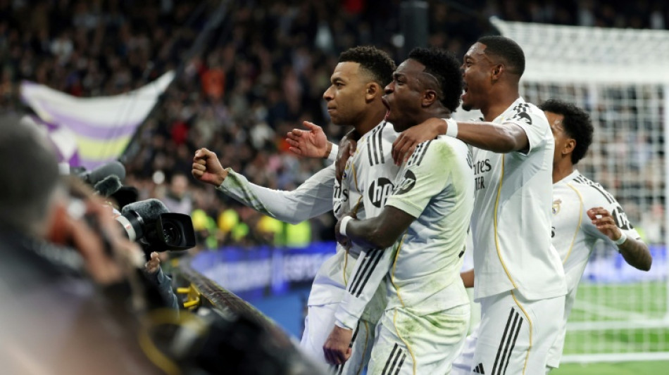 Mbappe penalty earns Real Madrid late win over nine-man Rayo
