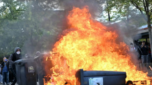 Smouldering bins, halted trams as French pupils protest