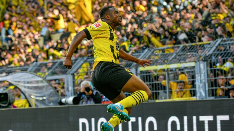Dortmund go top as 'laissez-faire' Bayern stunned away at Augsburg