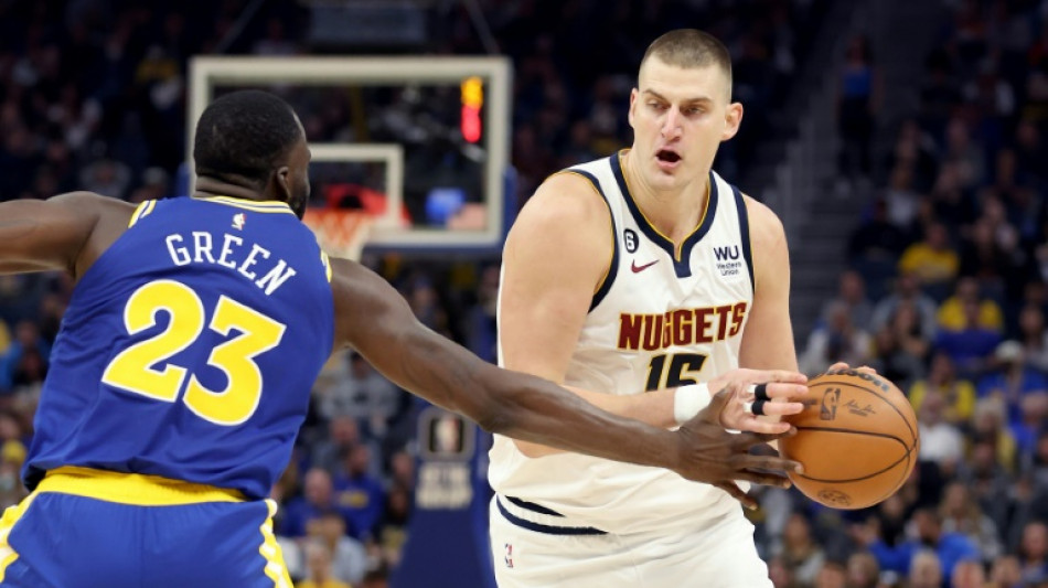 Jokic posts triple double as Nuggets stun Warriors