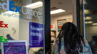 Stocks slide as investors weigh data, interest rate cuts