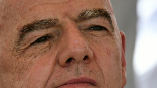 Beleaguered FIFA chief Infantino rids himself of critic Lamour