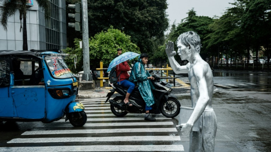 A Jakarta, des "hommes d'argent" qui en voient rarement la couleur