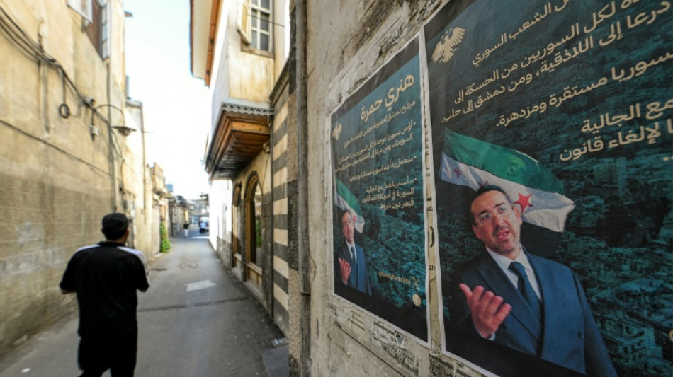 S&iacute;rios escolhem membros de seu primeiro Parlamento ap&oacute;s a queda de Assad