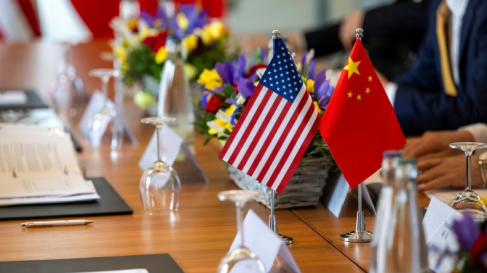 Stocks mixed as investors track US-China trade talks