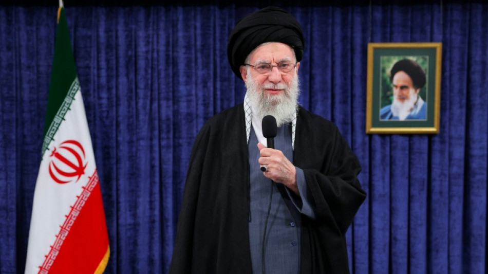 Iran steps up arrests while remaining positive on US talks
