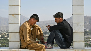 Afghan students divided over smartphone ban at universities