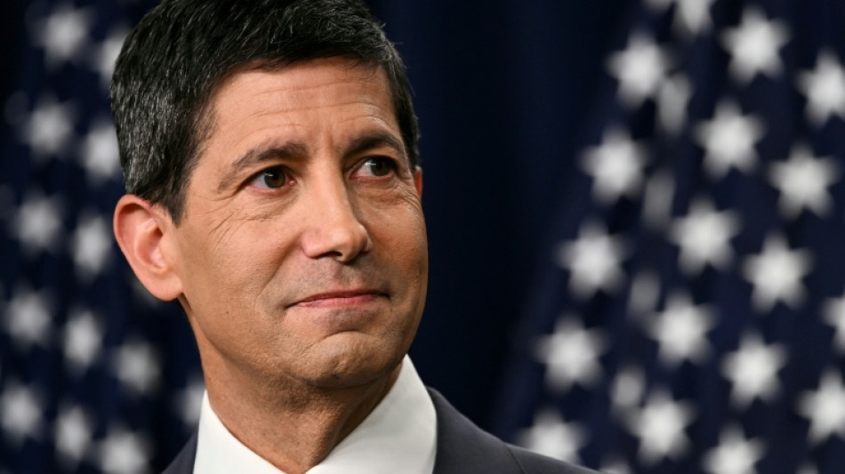 Stocks, dollar rise after Fed chief lifts rate expectations