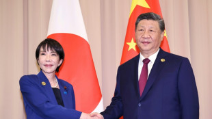 Japan PM says raised 'serious concerns' with Xi on South China Sea, Xinjiang