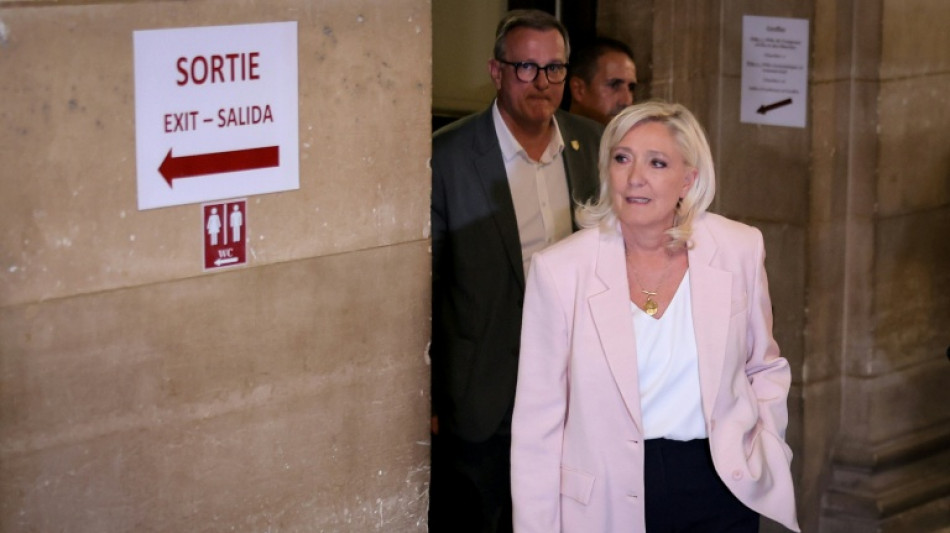 France's Le Pen arrives in court for key ruling in race for president