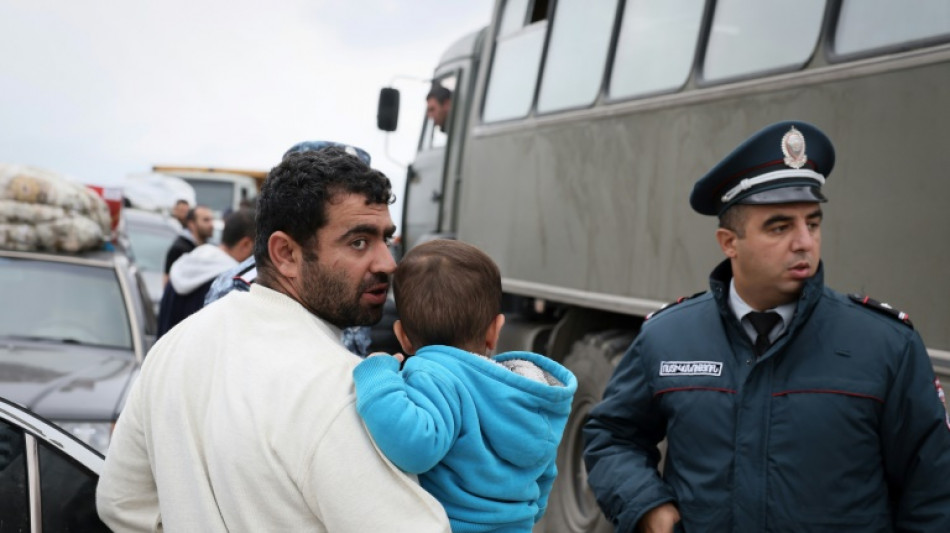 Thousands flee enclave as Azerbaijan, Armenia envoys to meet