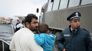 Thousands flee enclave as Azerbaijan, Armenia envoys to meet