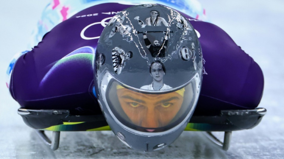 Selenskyj verteidigt Helm eines Olympia-Athleten mit  im Krieg get&ouml;teten Ukrainern darauf