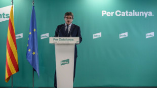 Militantes do partido de l&iacute;der separatista catal&atilde;o apoiam decis&atilde;o de romper com Madri