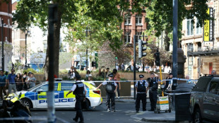 Woman arrested after four men stabbed in central London
