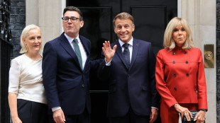 British, French leaders talk migrants, EU relations