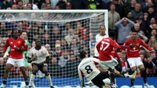 Man Utd beat Liverpool to secure Champions League place