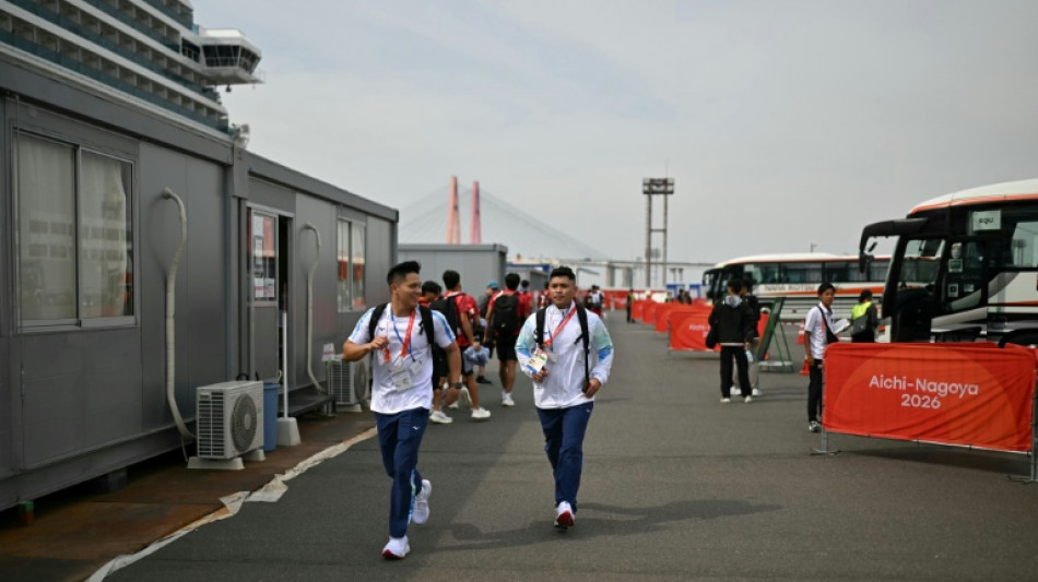 Japan Olympic chief says 'lot more' athletes at Games than expected
