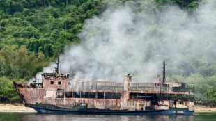 Philippine Coast Guard battles smoke in search for ferry fire missing