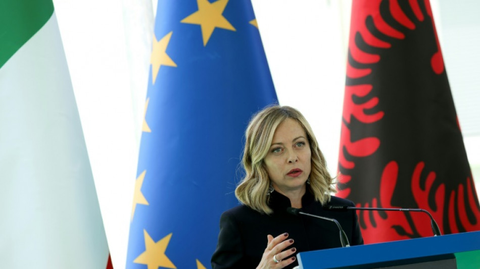 EU voting passes halfway mark with Slovakia, Italy joining in