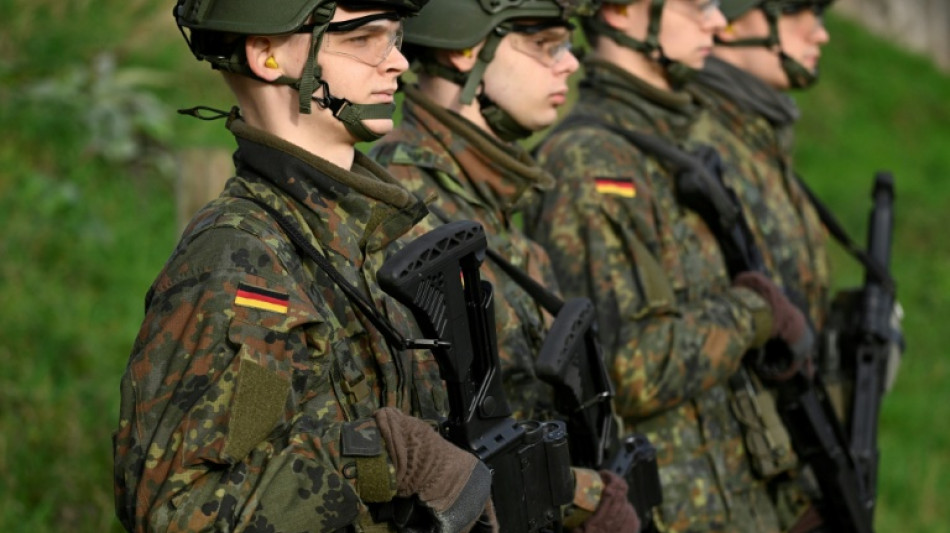 Germany agrees to keep military service voluntary
