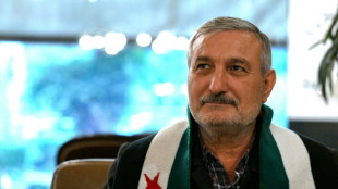 De retour à Damas, un chef rebelle se dit confiant dans l'unité post-Assad