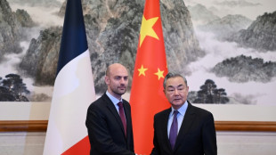 In Beijing, France FM urges 'powerful' ties with China