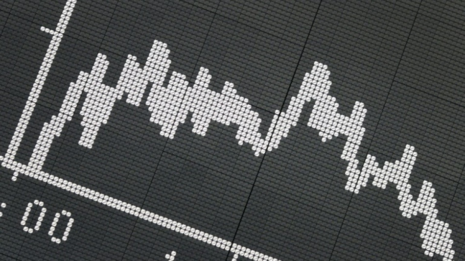 Asian markets mostly down on worries over rate hikes, inflation