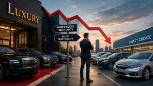 Luxury car buyers trade prestige for mainstream value